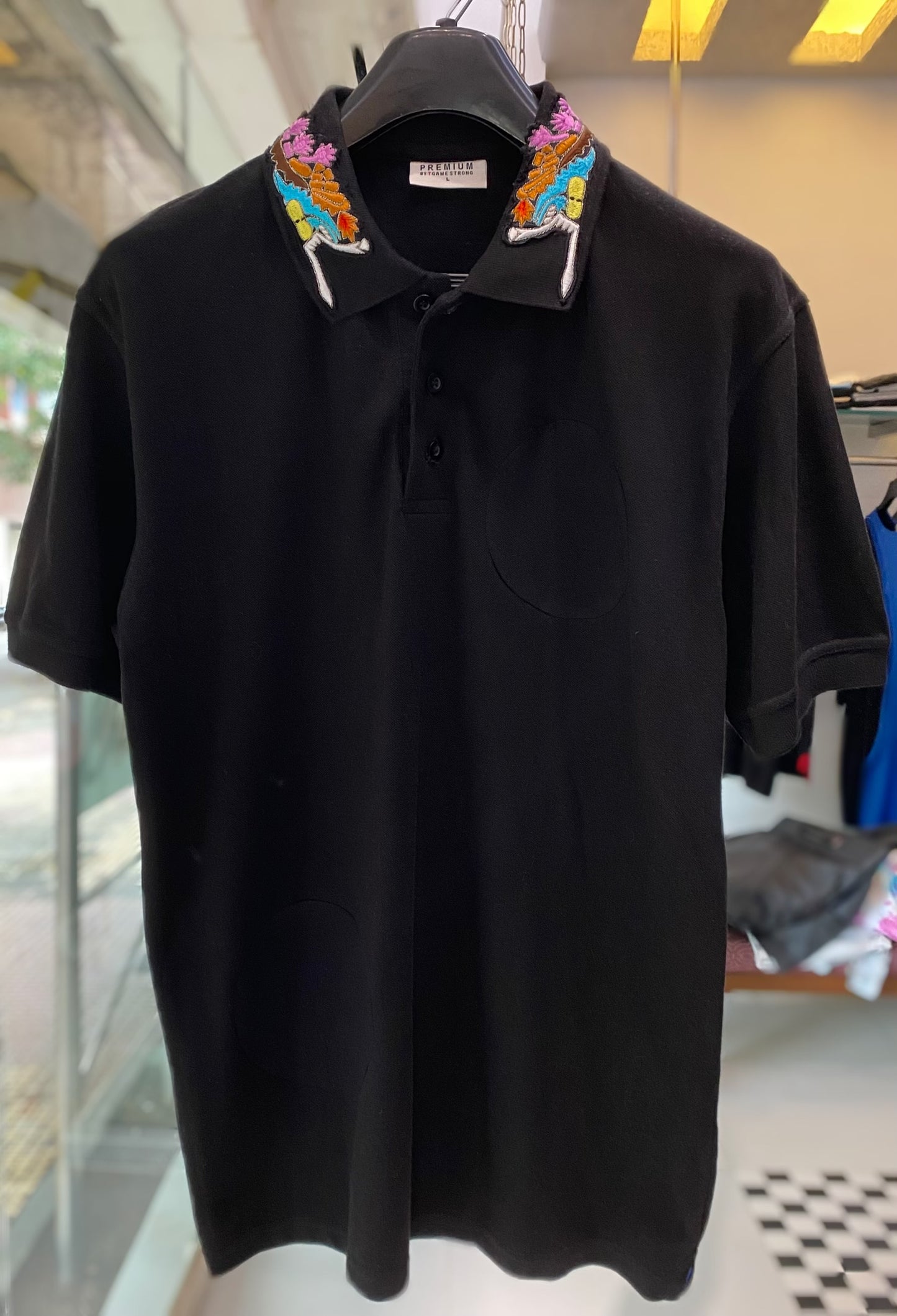 Black embroidered polo tee